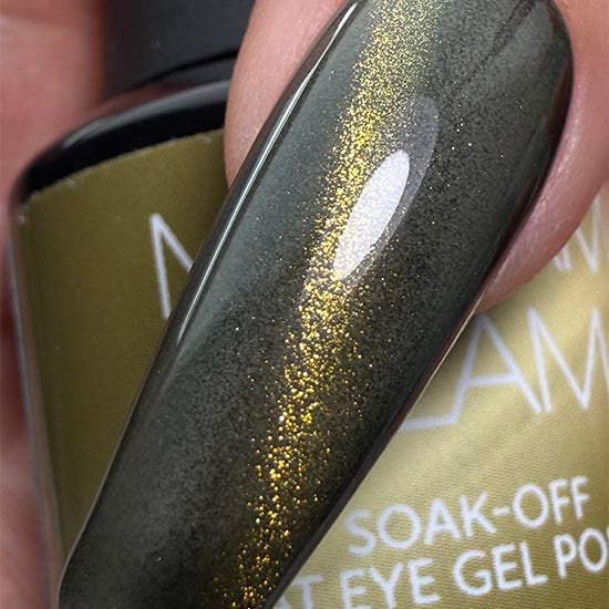 Bottle of Madam Glam Potion Dust, a shimmering cosmetic powder with a vibrant, iridescent finish suitable for nail art.