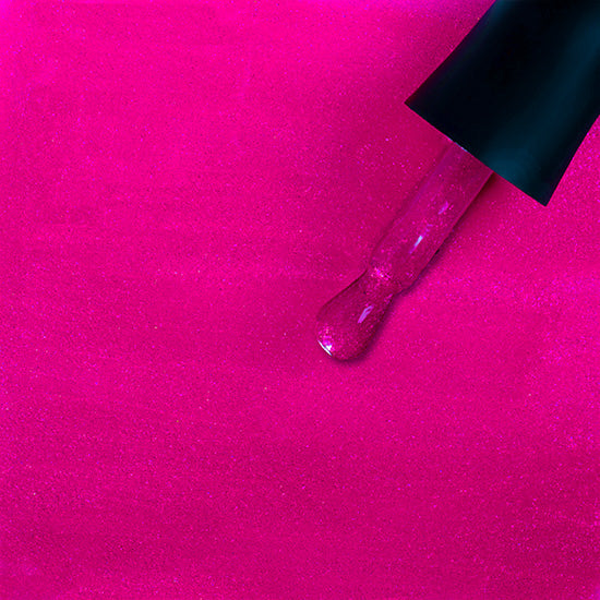 Madam Glam Raspberry Kiss nail polish bottle with vibrant raspberry pink color and sleek branding.