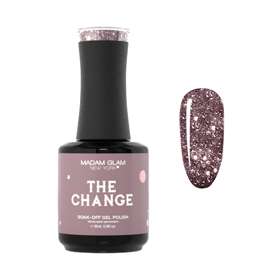 Madam Glam The Change nail polish bottle with sleek black cap and clear label, showcasing vibrant nail polish color.