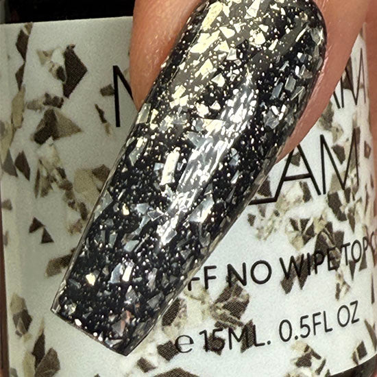 Madam Glam Touches of Silver nail polish bottle with silver-colored cap and label, showcasing a sleek, modern design.