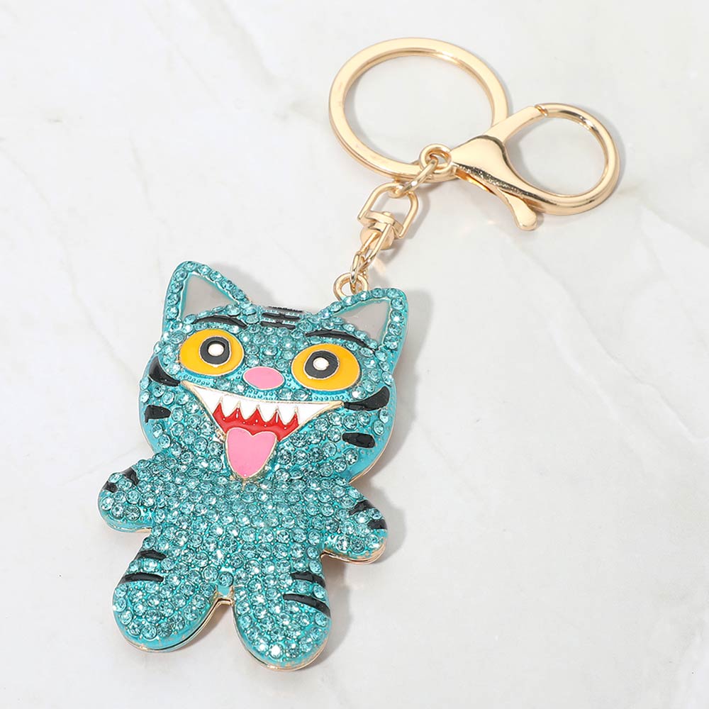 Bling studded Kpop Demon Hunters Derpy keychain bag charm with colorful embellishments, attached to a bag or wallet.