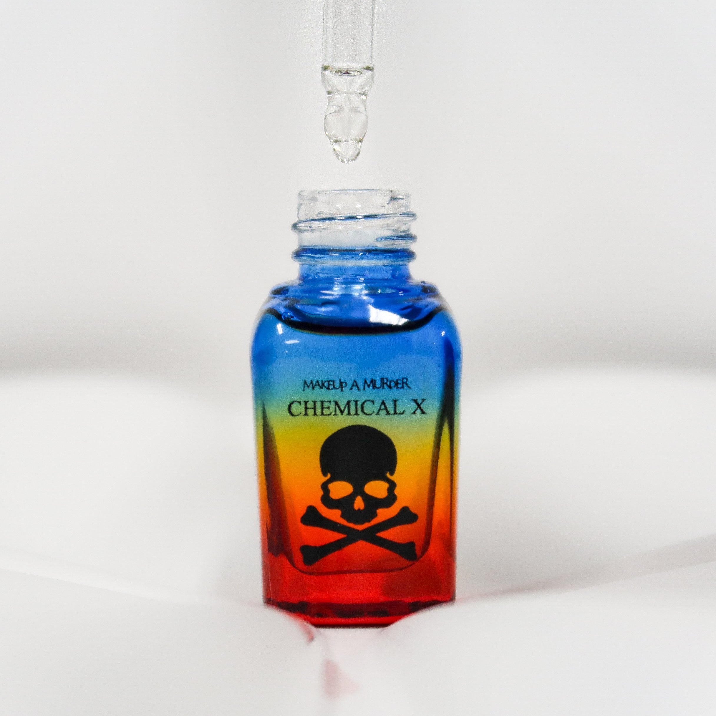 Neon pigments from Makeup A Murder, INC, Chemical X Cosmetic Mixing Sealant for vibrant, colorful cosmetic applications.