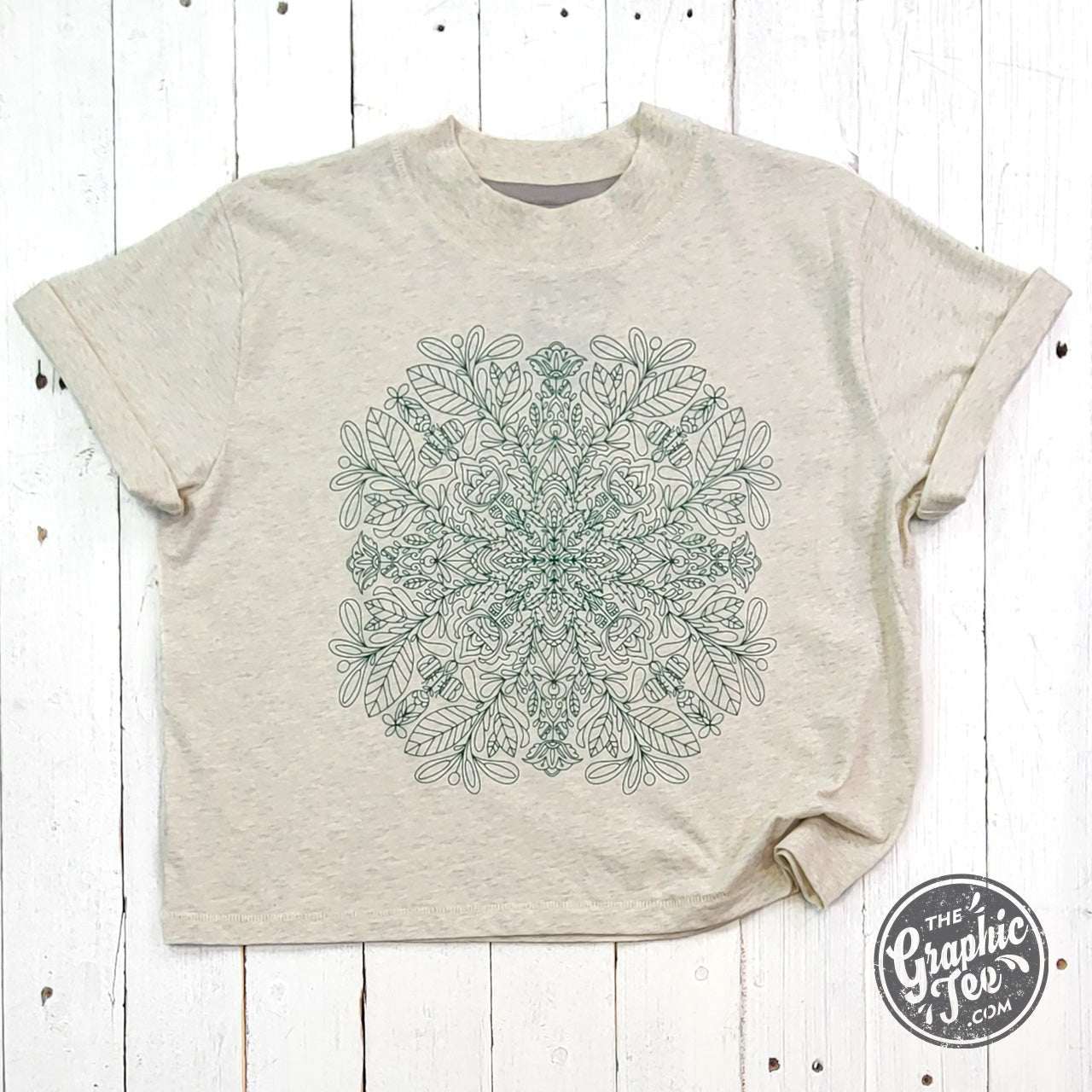 Mandala mid-length crop drop-sleeve short sleeve tee by The Graphic Tee, featuring a colorful mandala design on lightweight shirt.