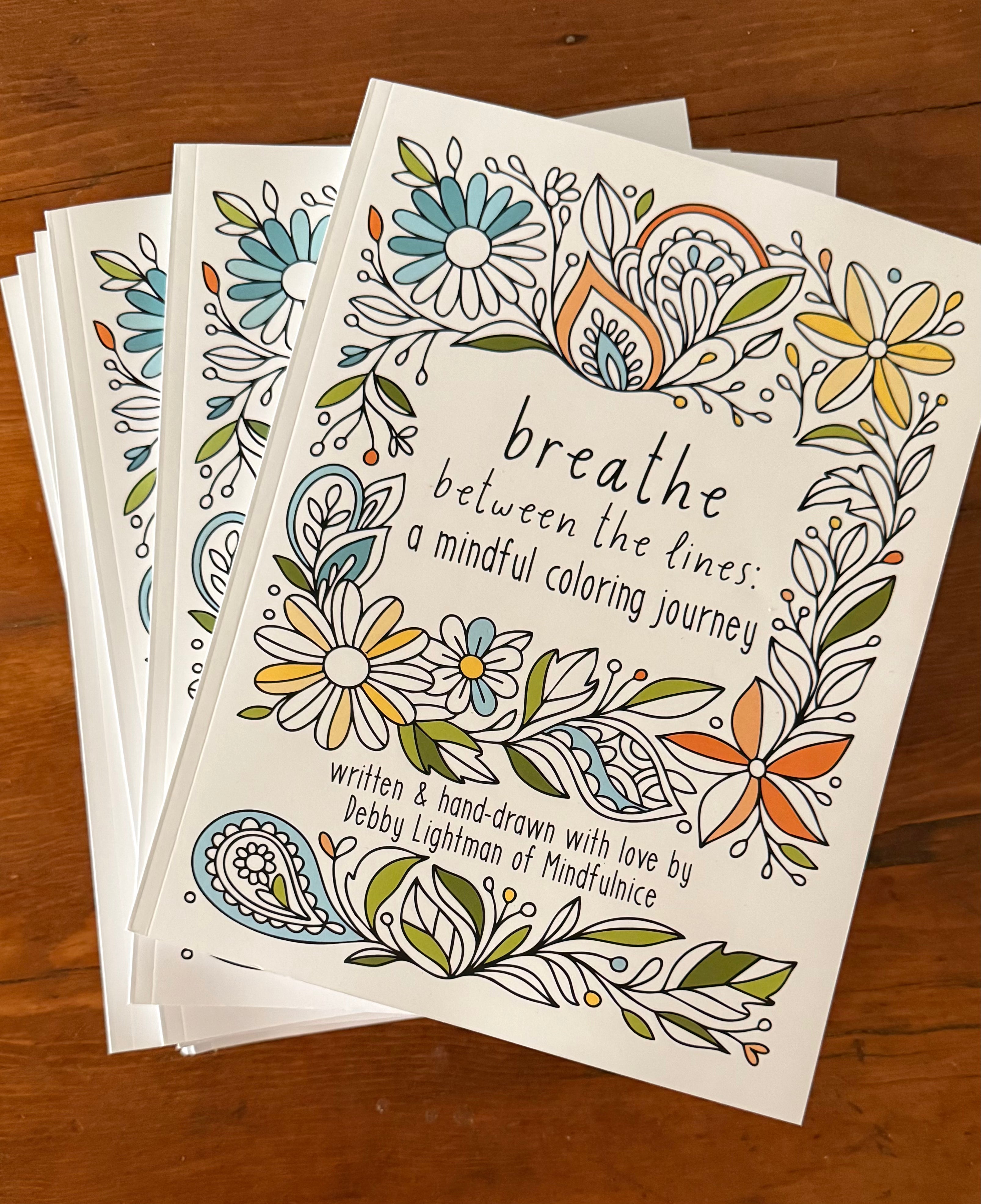 Mindfulnice Breathe Between The Lines coloring book cover featuring calming line art for mindful coloring.