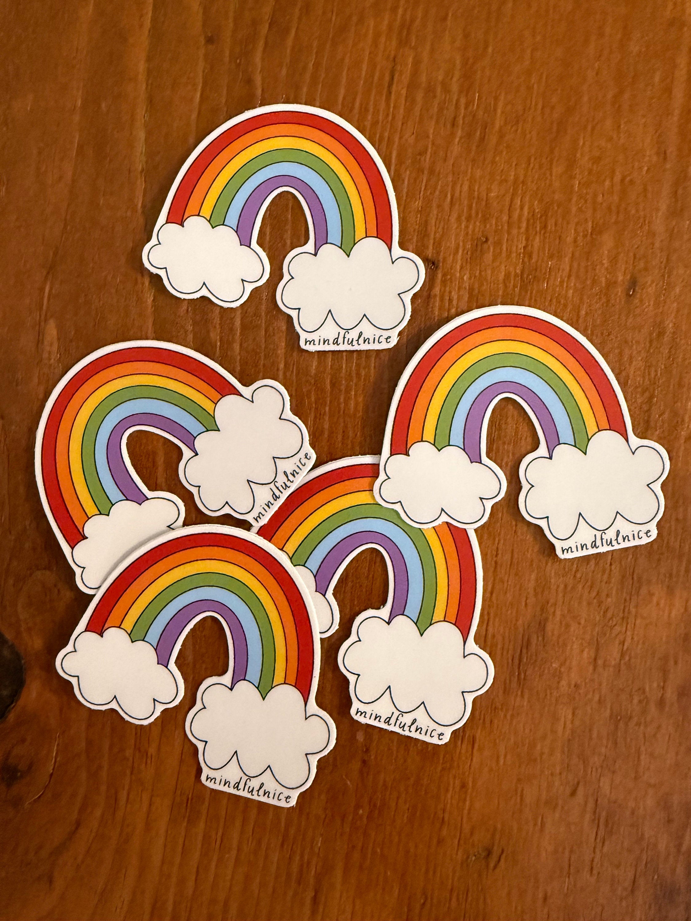 Colorful rainbow sticker from Mindfulnice featuring vibrant, bold hues on a clear adhesive backing.