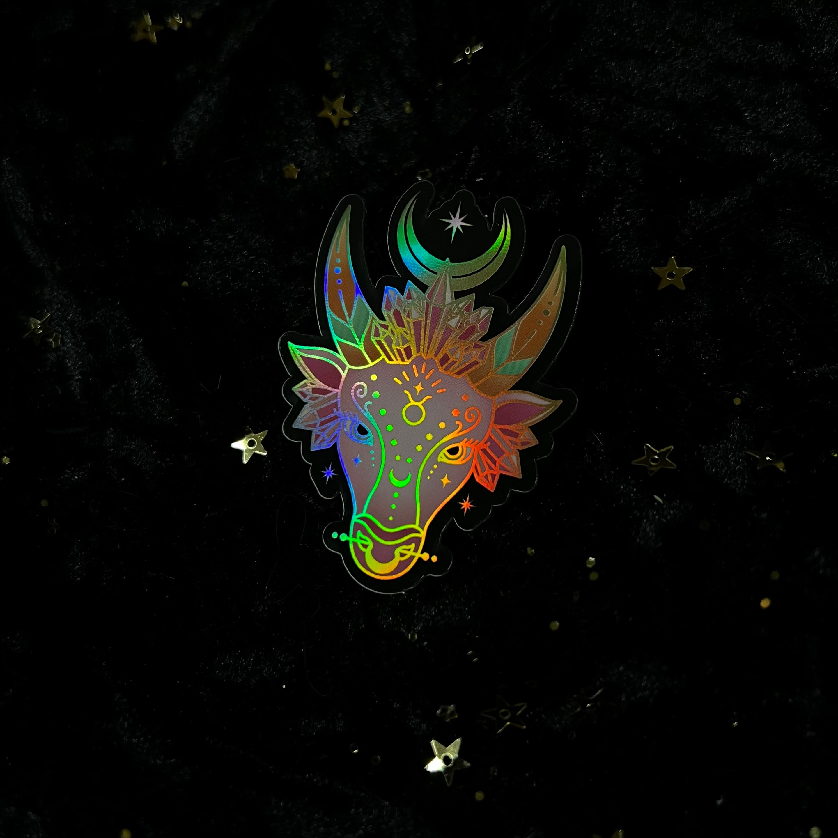 Crystals for the Zodiacs sticker by Moonstruck Crystals featuring colorful zodiac symbols and crystal illustrations on a white background.