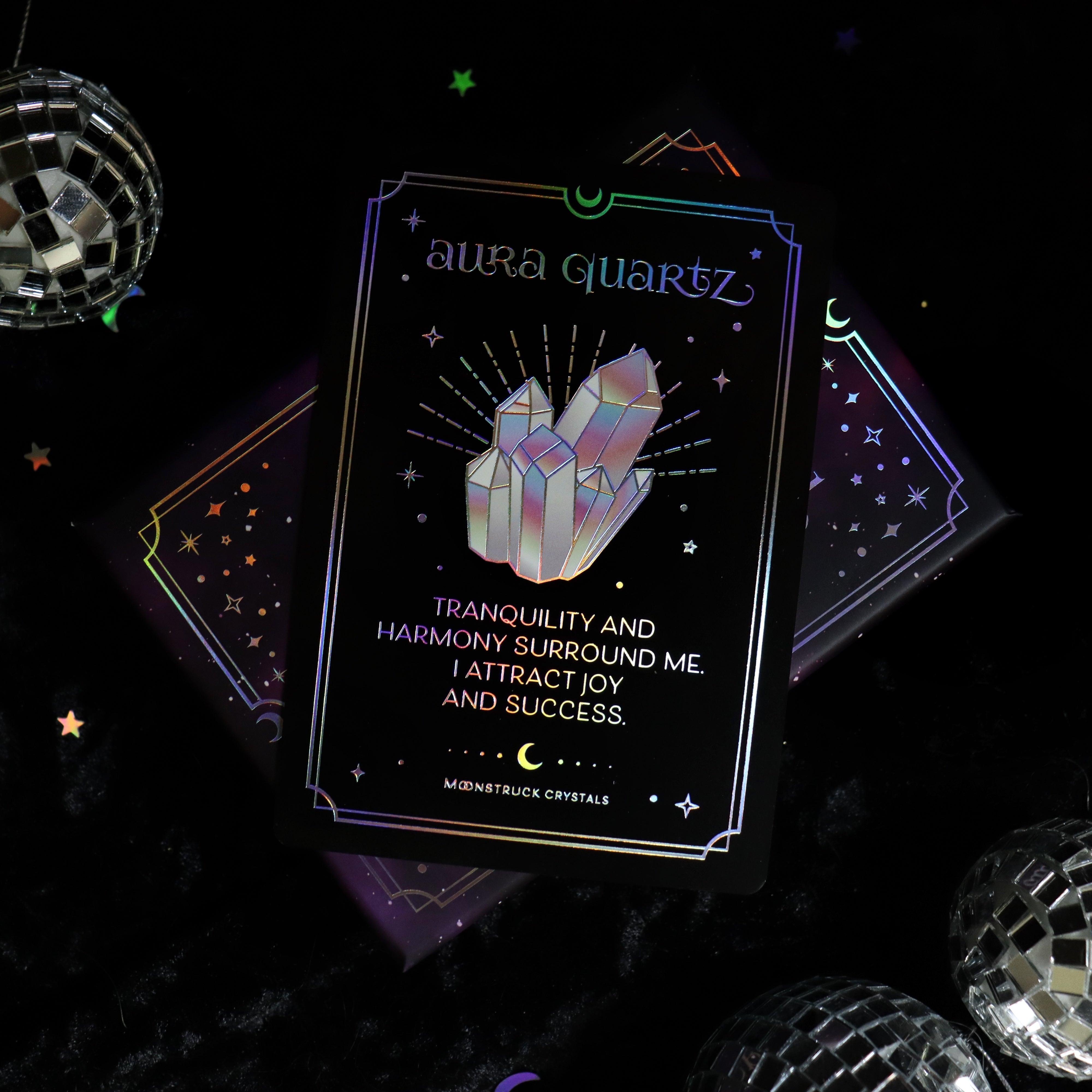 Silver Crystal Affirmations© Card Deck by Moonstruck Crystals featuring colorful affirmation cards with crystal illustrations and positive messages.