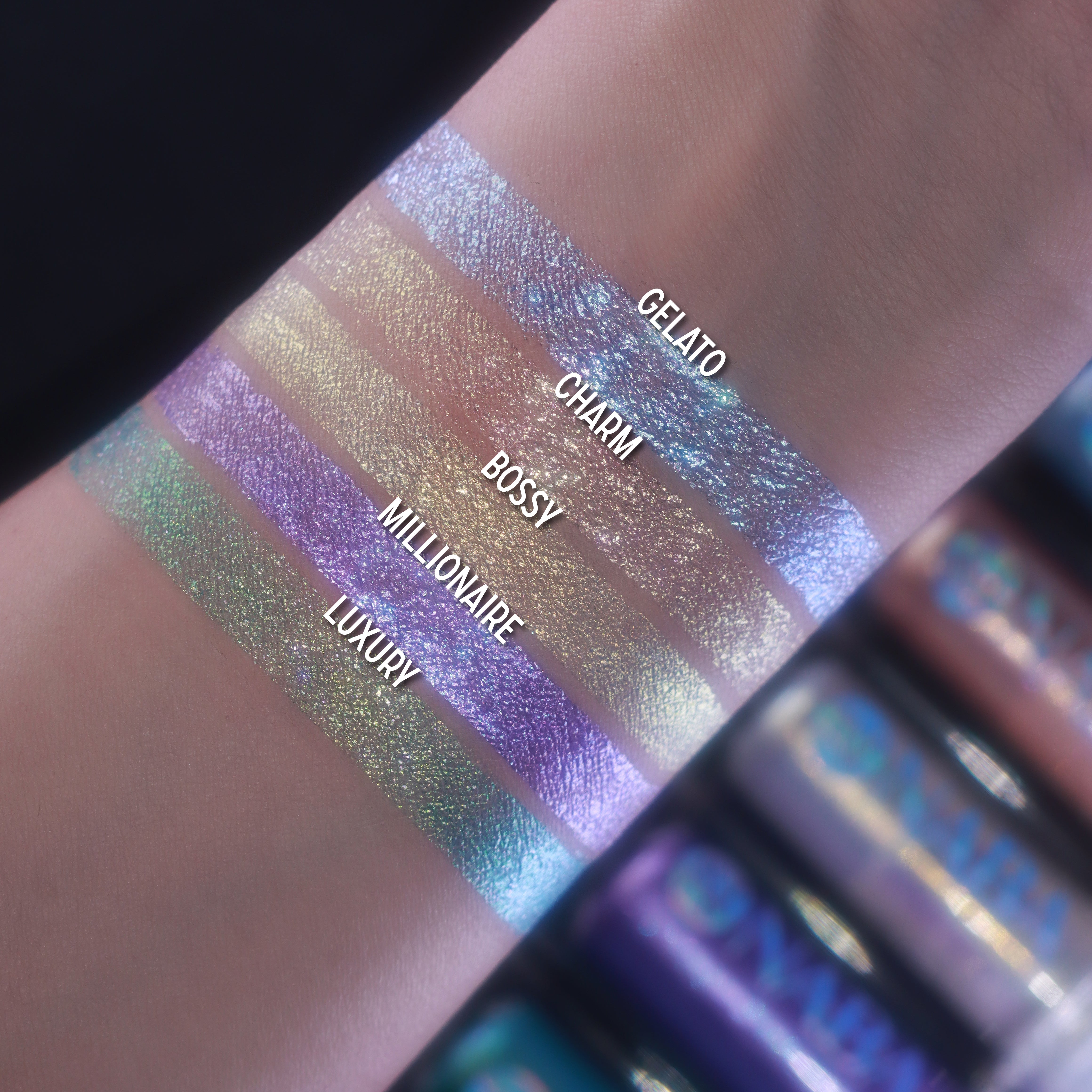 NABA Cosmetics USA Charm Liquid Eyeshadow in a sleek applicator tube, showcasing the shimmering, metallic eye makeup product.