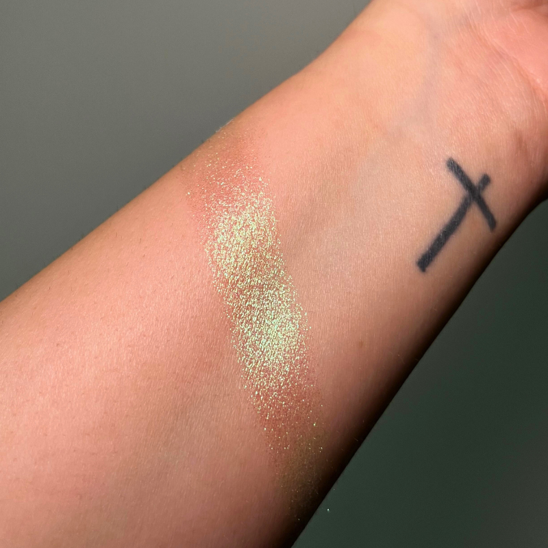 Creamy Pigment Sakura by NABA Cosmetics USA, vibrant pink eyeshadow with a smooth, creamy texture, shown in a close-up image.