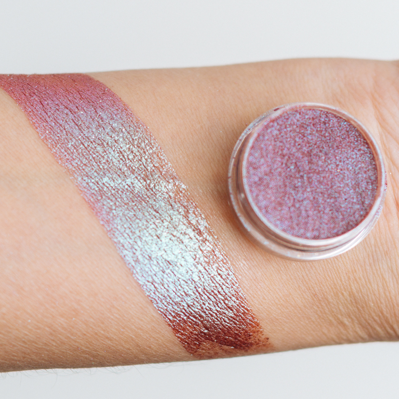 Vibrant Gummi Pigment by NABA Cosmetics USA shown in a close-up image, highlighting the colorful, textured cosmetic pigment.