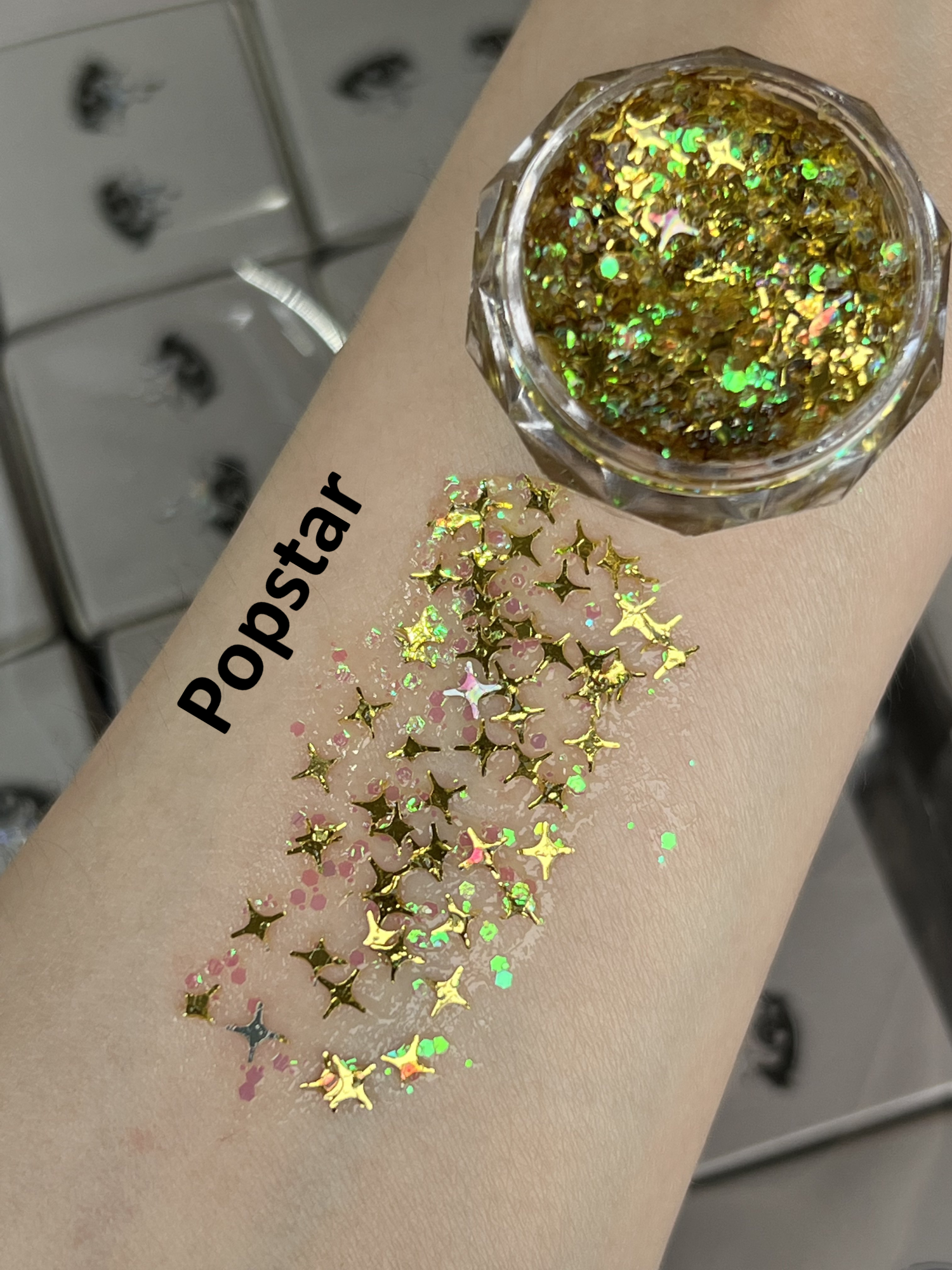 Nekoyanin Gel Glitter Tears in a jar with shimmering gold and silver glitter for artistic and decorative nail designs.