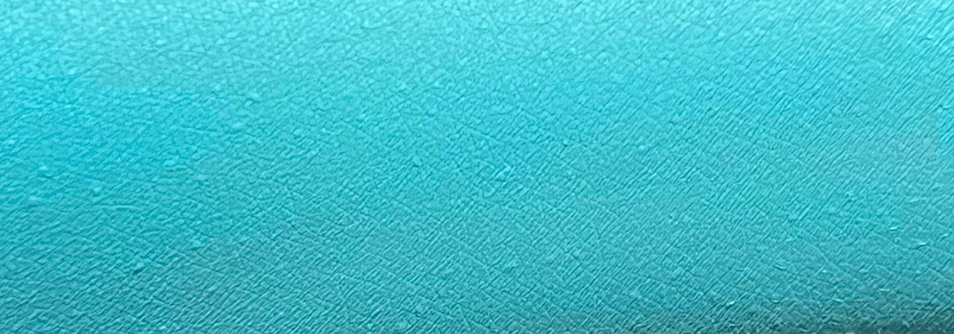 Teal blue water-activated graphic eyeliner by Nekoyanin, shown with vibrant color and intricate design on the eye.
