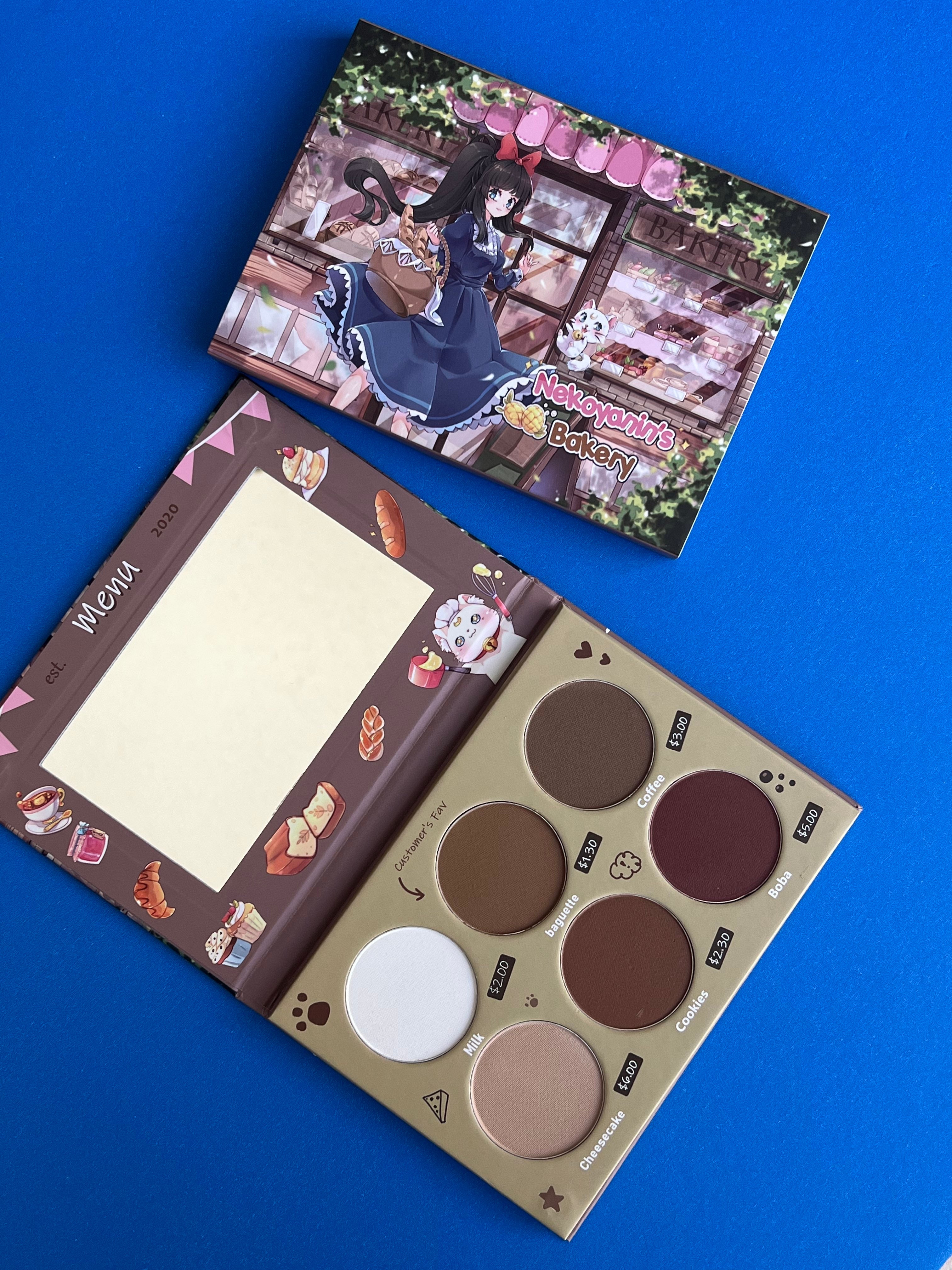 Nekoyanin Bakery Contour Palette with various shades for facial contouring and highlighting in a sleek compact.