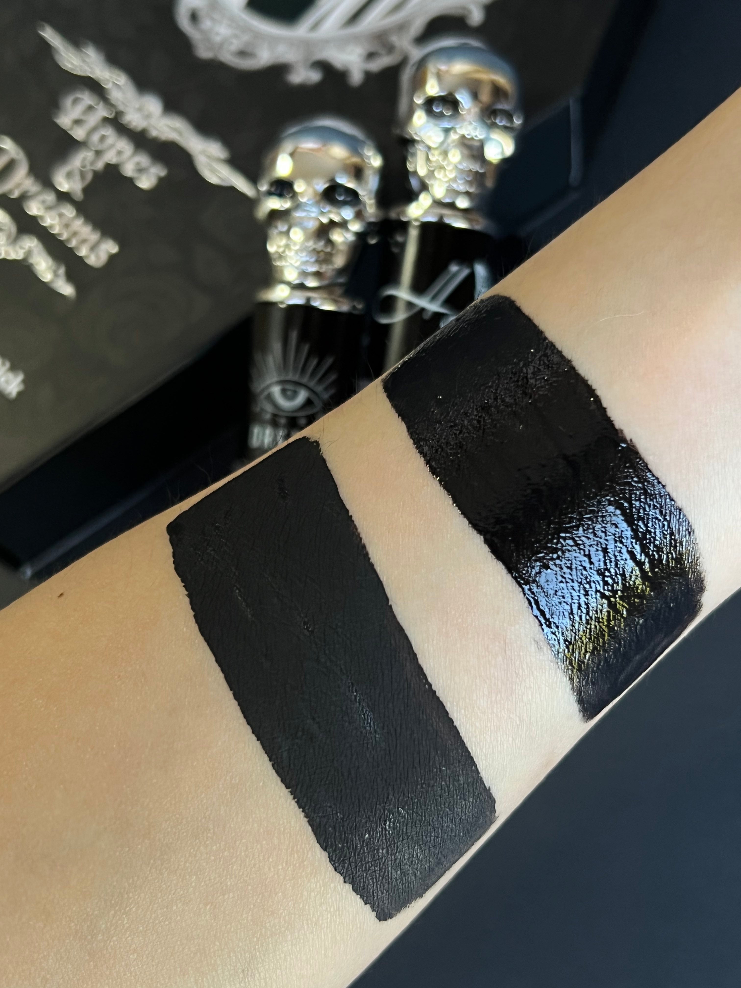 Nekoyanin Hopes And Dreams black liquid lipstick and lip gloss duo, featuring sleek black packaging and applicators.