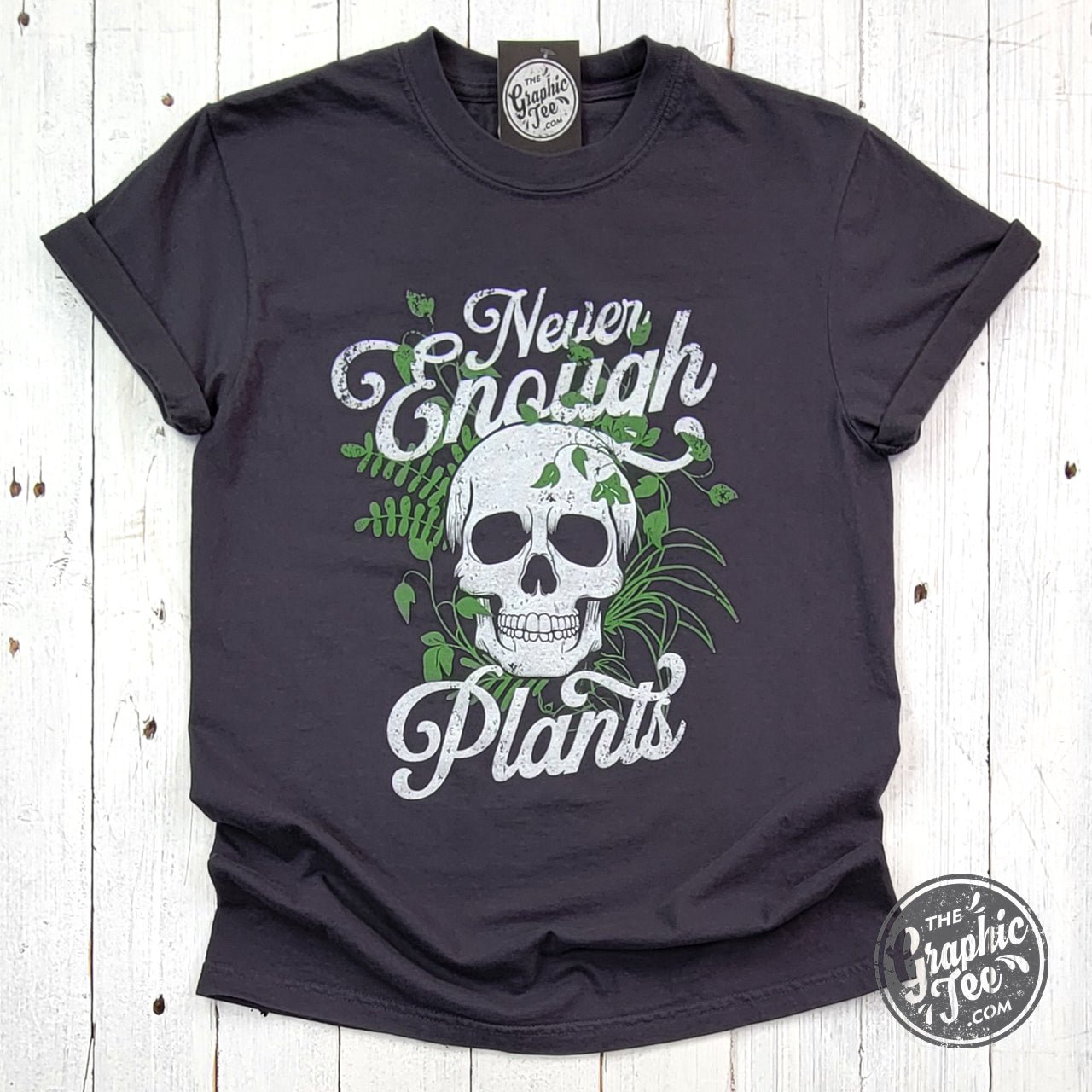 Never Enough Plants pigment dyed graphic T-shirt by The Graphic Tee, featuring vibrant plant-inspired design on soft cotton fabric.