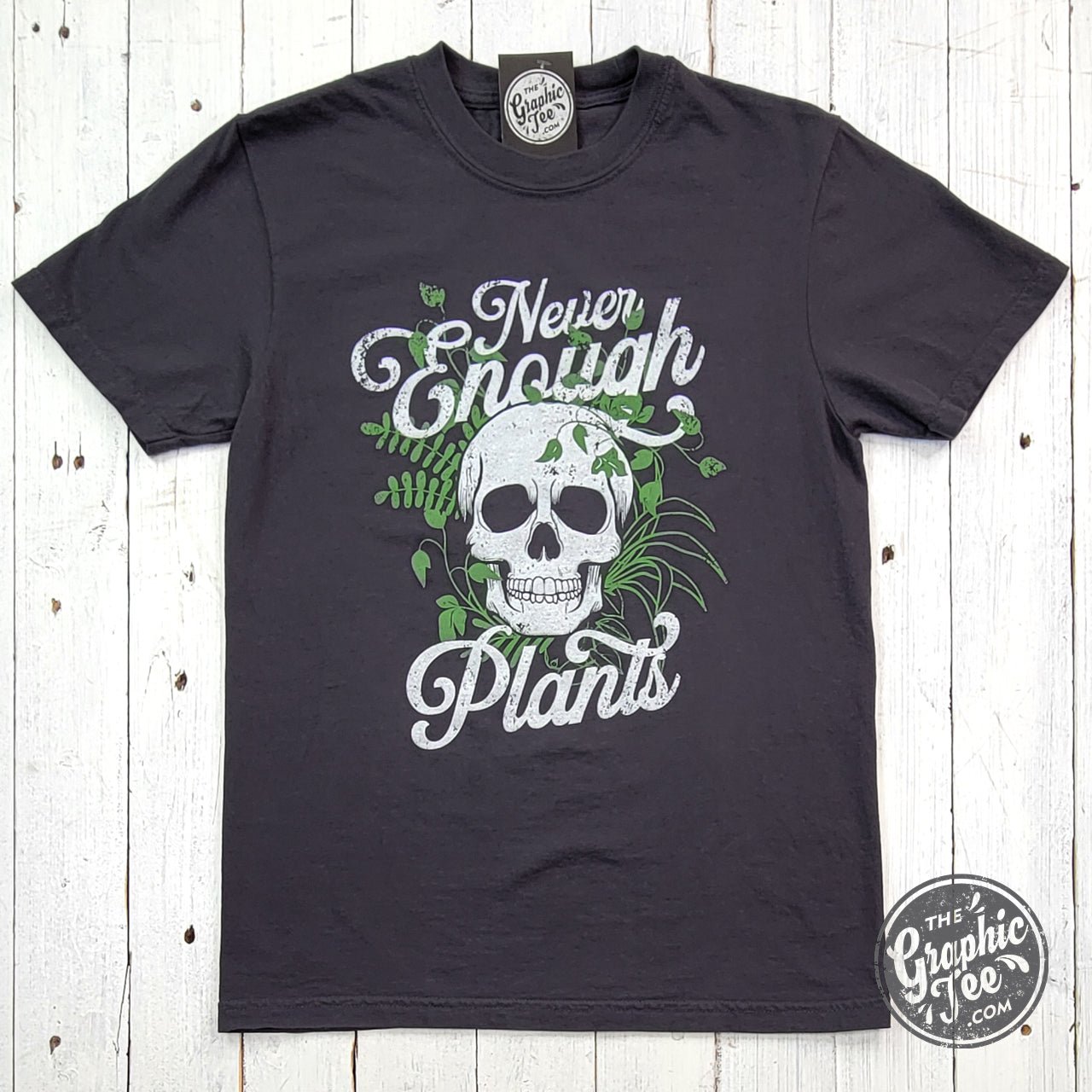 Never Enough Plants pigment dyed graphic SS T-shirt by The Graphic Tee, showing a colorful plant-themed design on soft fabric.