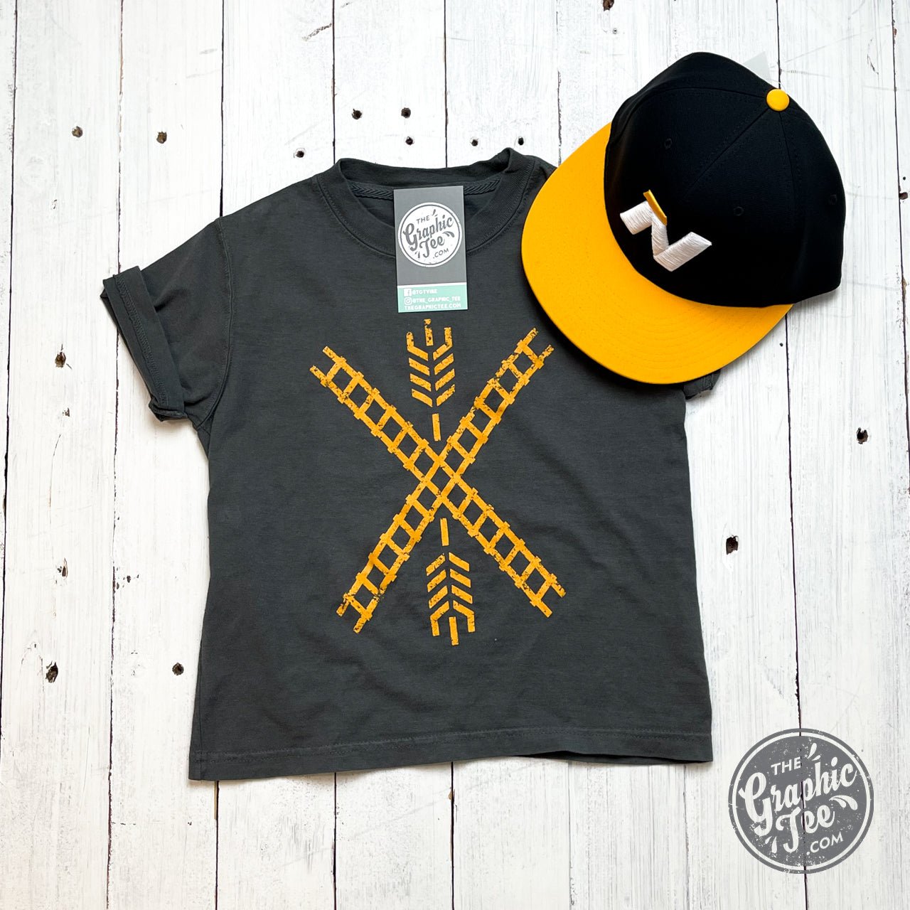 Youth graphic tee featuring a Newton flag design, made by The Graphic Tee, with a comfortable wash finish and vibrant colors.