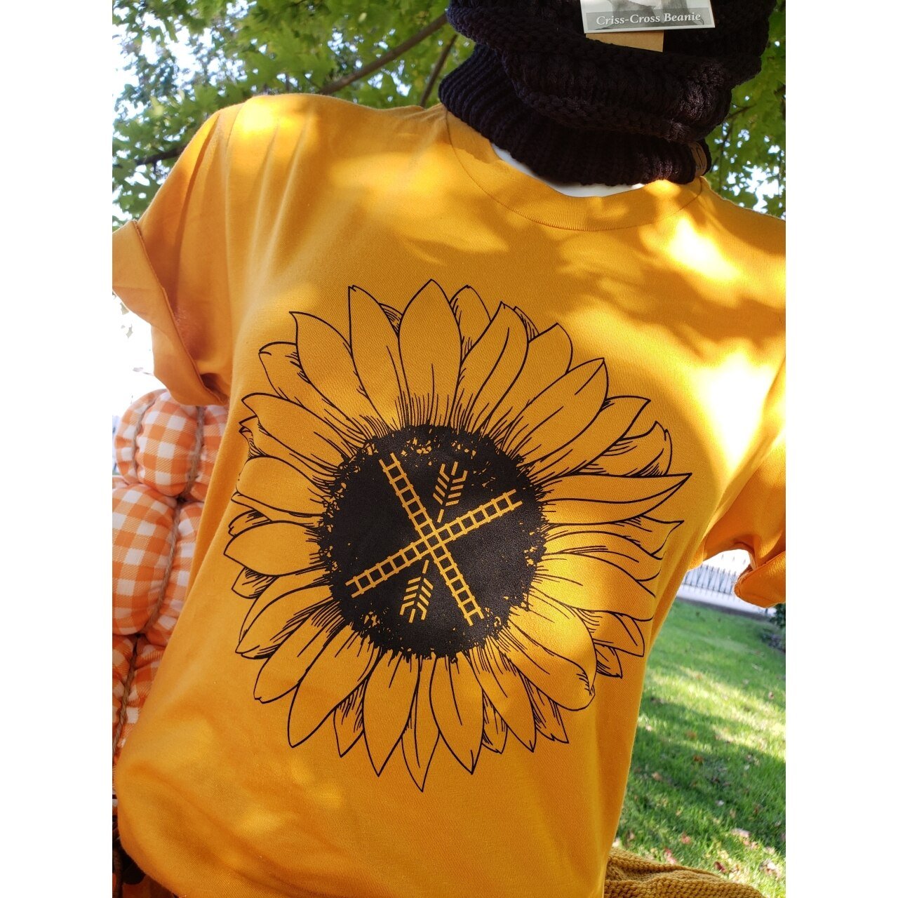 Unisex graphic tee featuring a sunflower and Newton flag design, from The Graphic Tee collection.