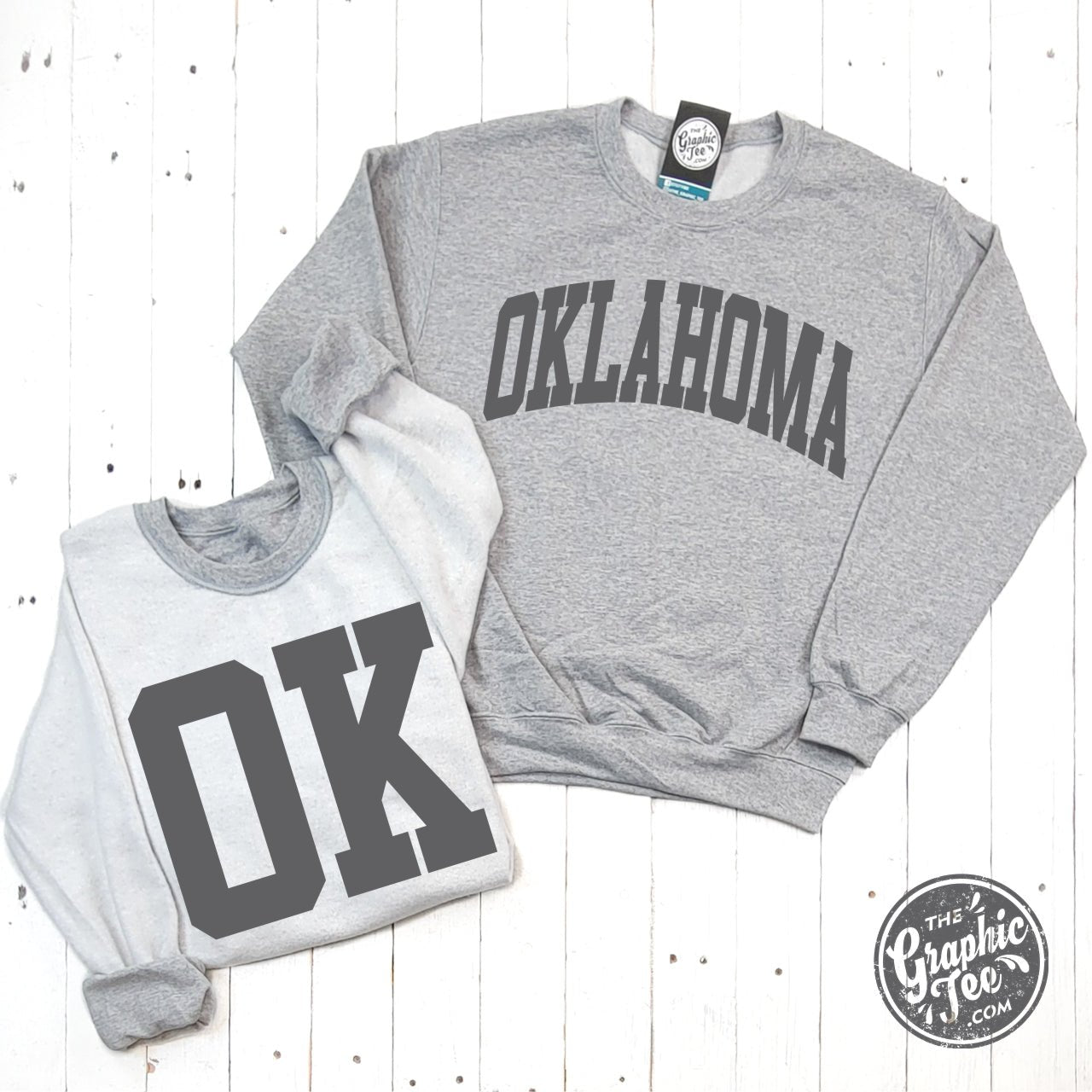Oklahoma reversible sport grey crewneck sweatshirt by The Graphic Tee, showing front and back design in a casual style.