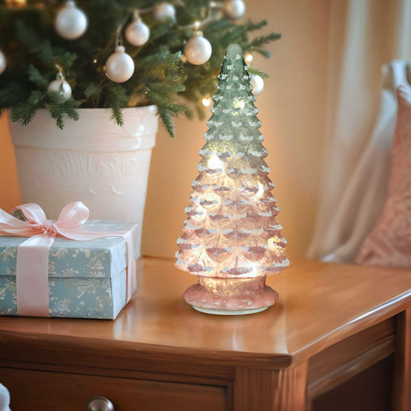 Old World Christmas 14-inch lit pink glass tabletop tree with intricate details and festive lighting, perfect for holiday decor.