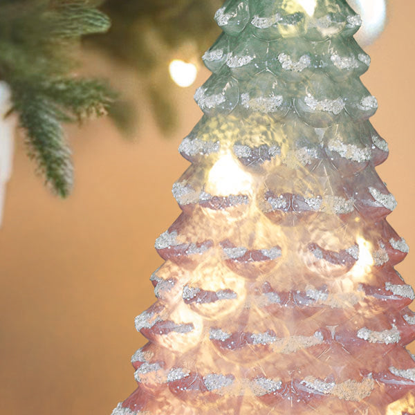 Pink glass tabletop tree, 14-inch lit decorative ornament by Old World Christmas, featuring intricate pink glass branches and festive details.