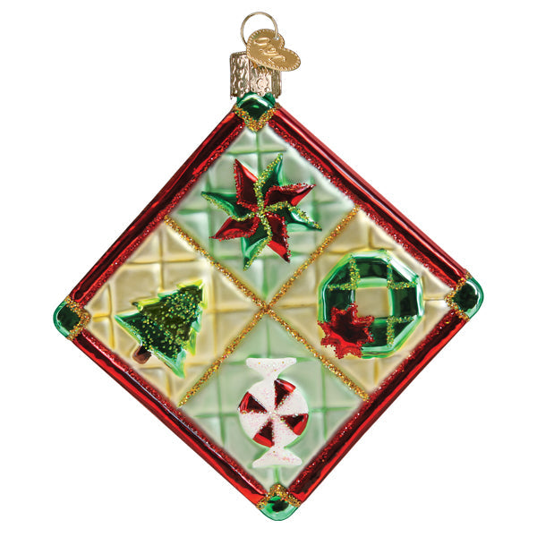 Old World Christmas Christmas quilt ornament featuring colorful patchwork design and festive holiday patterns.