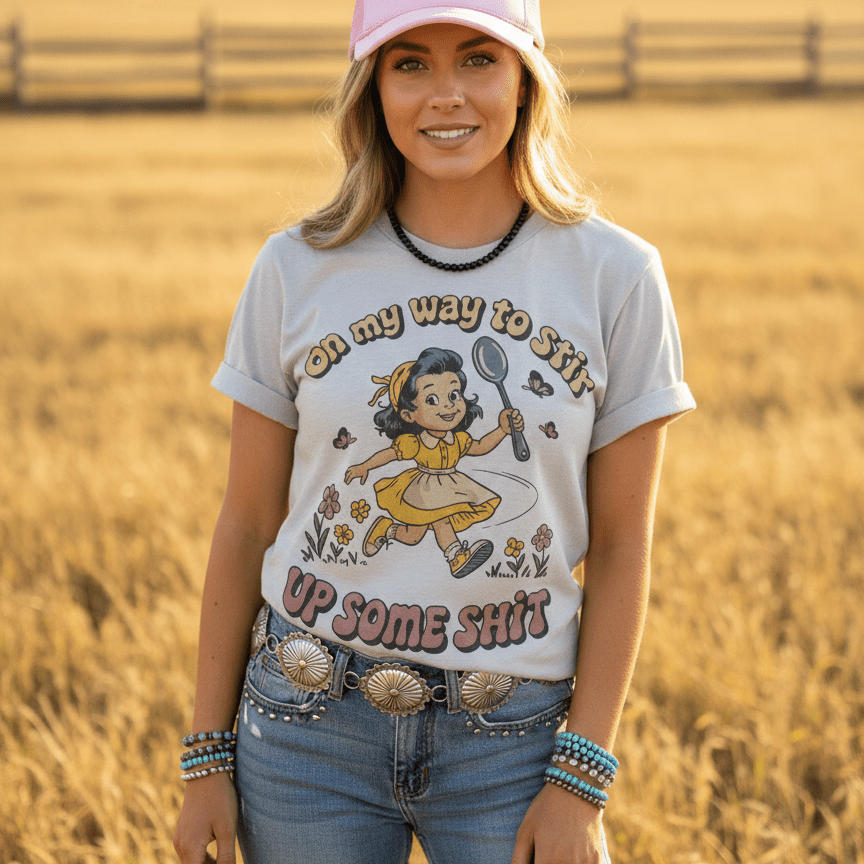 Wild Junkie graphic tee featuring bold text that reads "On My Way To Stir Up Some Shit" on a casual cotton T-shirt.