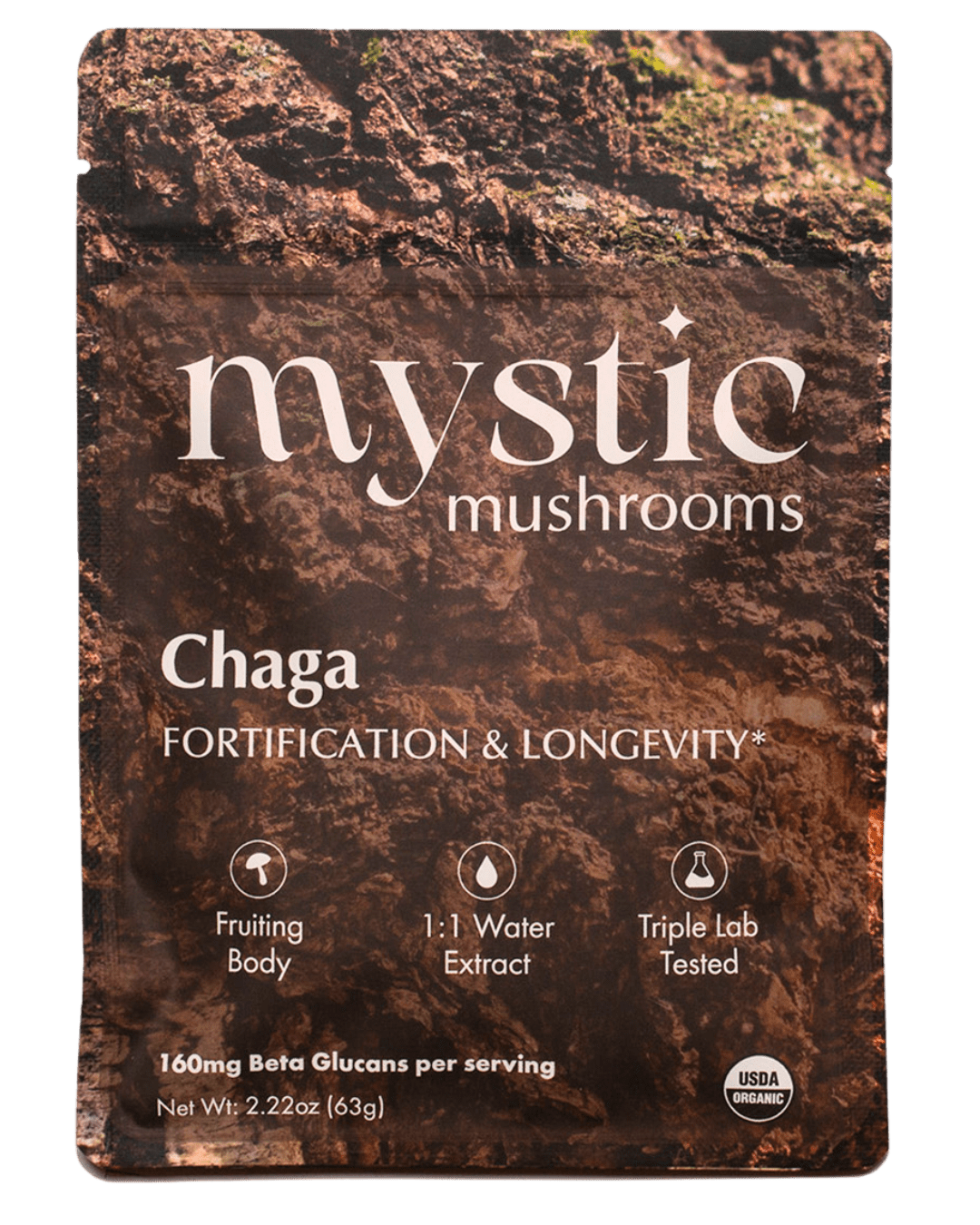 Pack of Ora Cacao Chaga mushroom supplement, showing dried Chaga chunks in a natural, earthy setting.