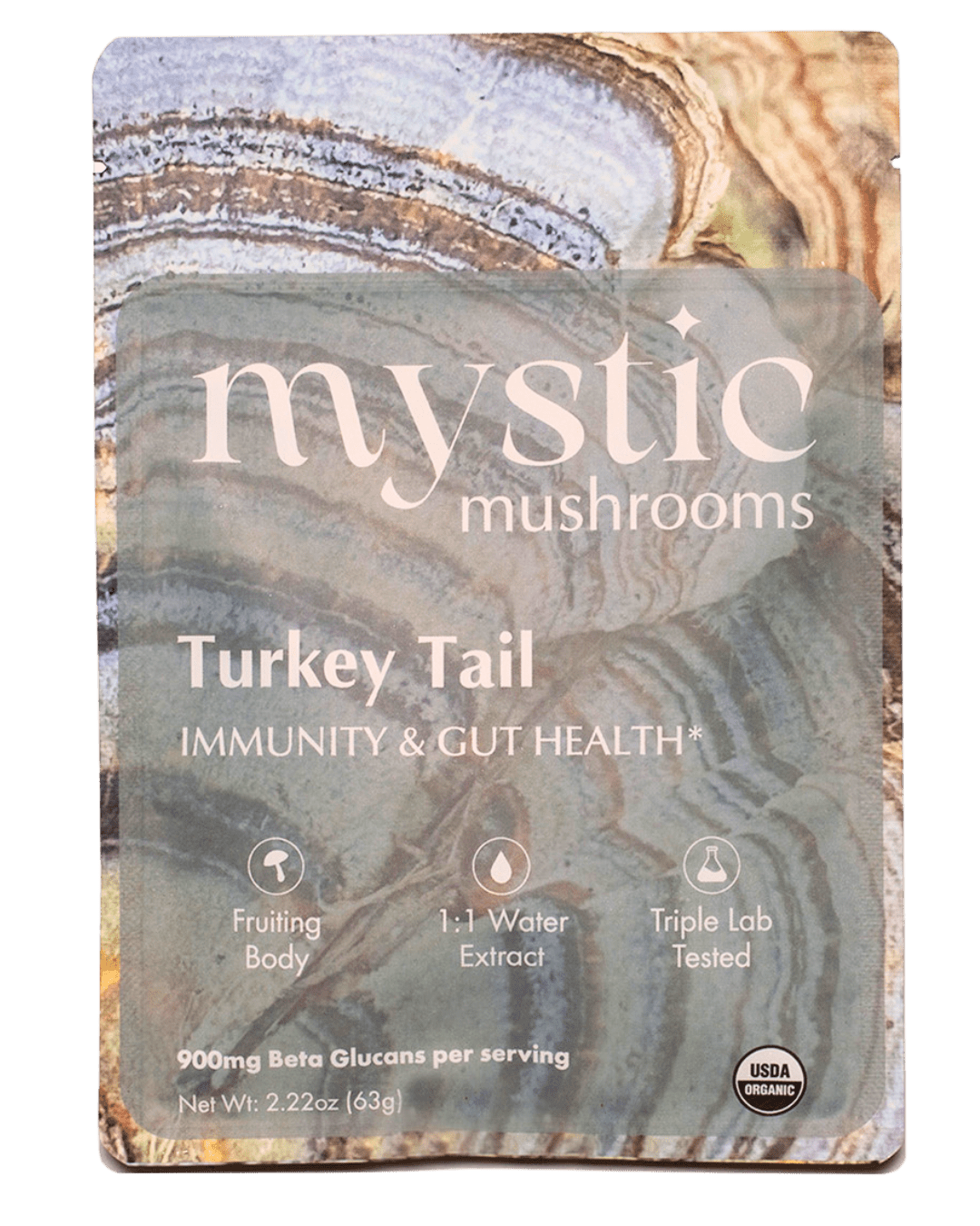 Ora Cacao Turkey Tail mushroom supplement in a clear bottle with a label, showing dried Turkey Tail fungi inside.