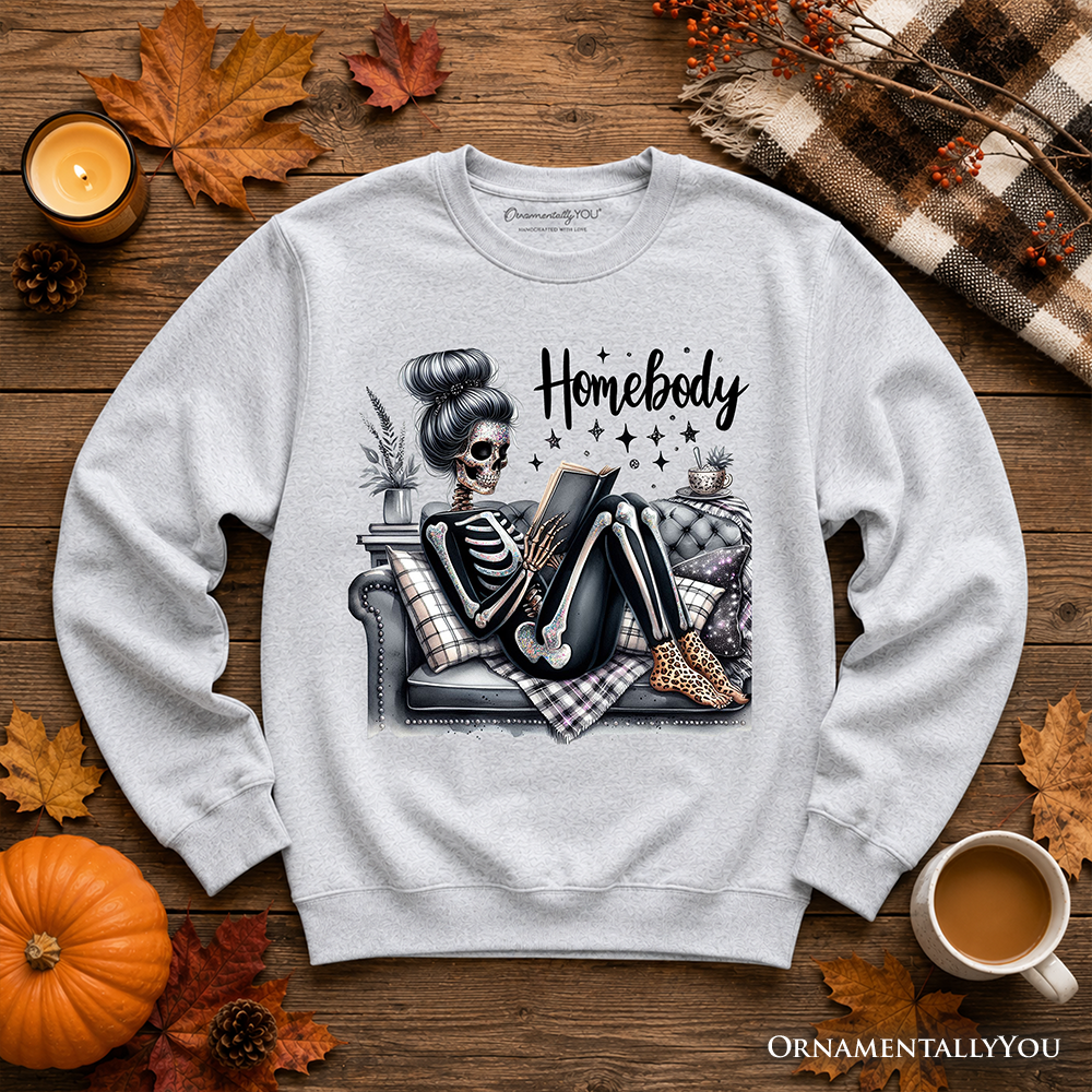 Ash gray Homebody Reading Skeleton sweatshirt by OrnamentallyYou, featuring a humorous lazy self-care design for introvert women.
