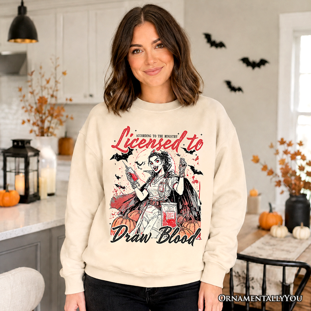 Ash-colored Licensed to Draw Blood Halloween Nurse sweatshirt by OrnamentallyYou featuring spooky season-themed spooky nurse graphic.