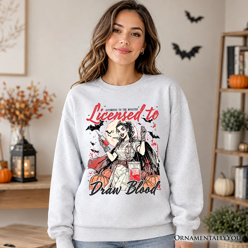 Gray Halloween nurse sweatshirt by OrnamentallyYou featuring spooky-themed blood draw graphic, perfect for spooky season.
