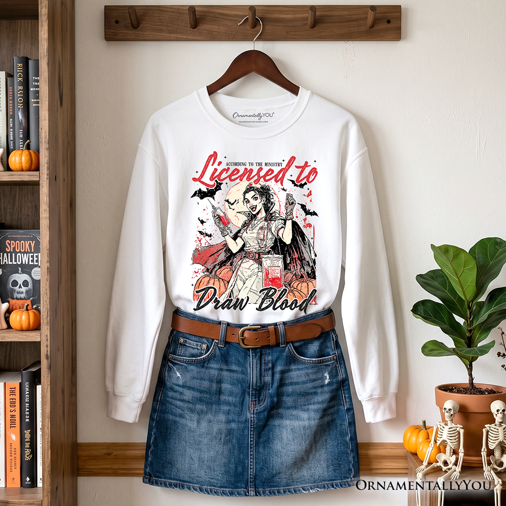 Ash gray Licensed to Draw Blood Halloween Nurse sweatshirt by OrnamentallyYou, featuring spooky season graphic design.