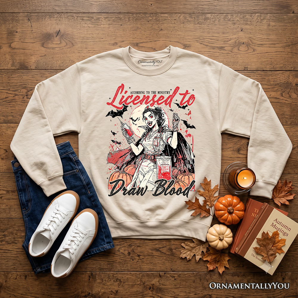 Ash gray Licensed to Draw Blood Halloween Nurse sweatshirt by OrnamentallyYou featuring spooky season graphic and comfortable sweatshirt fit.