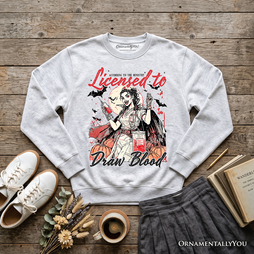 Orange Halloween nurse sweatshirt by OrnamentallyYou featuring spooky-themed graphics, perfect for the spooky season.
