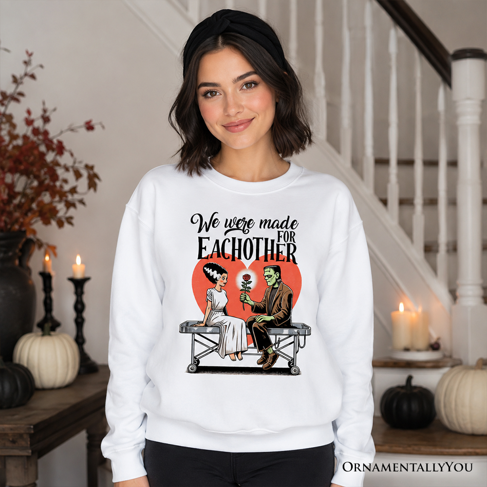Romantic Frankenstein and Bride sweatshirt by OrnamentallyYou, featuring spooky couple-themed design on ash-colored sweater.
