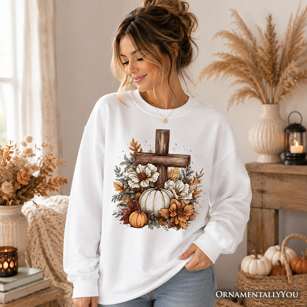 Christian Floral Pumpkin Cross sweatshirt by OrnamentallyYou featuring boho fall design, cozy sweater with religious and floral motifs.