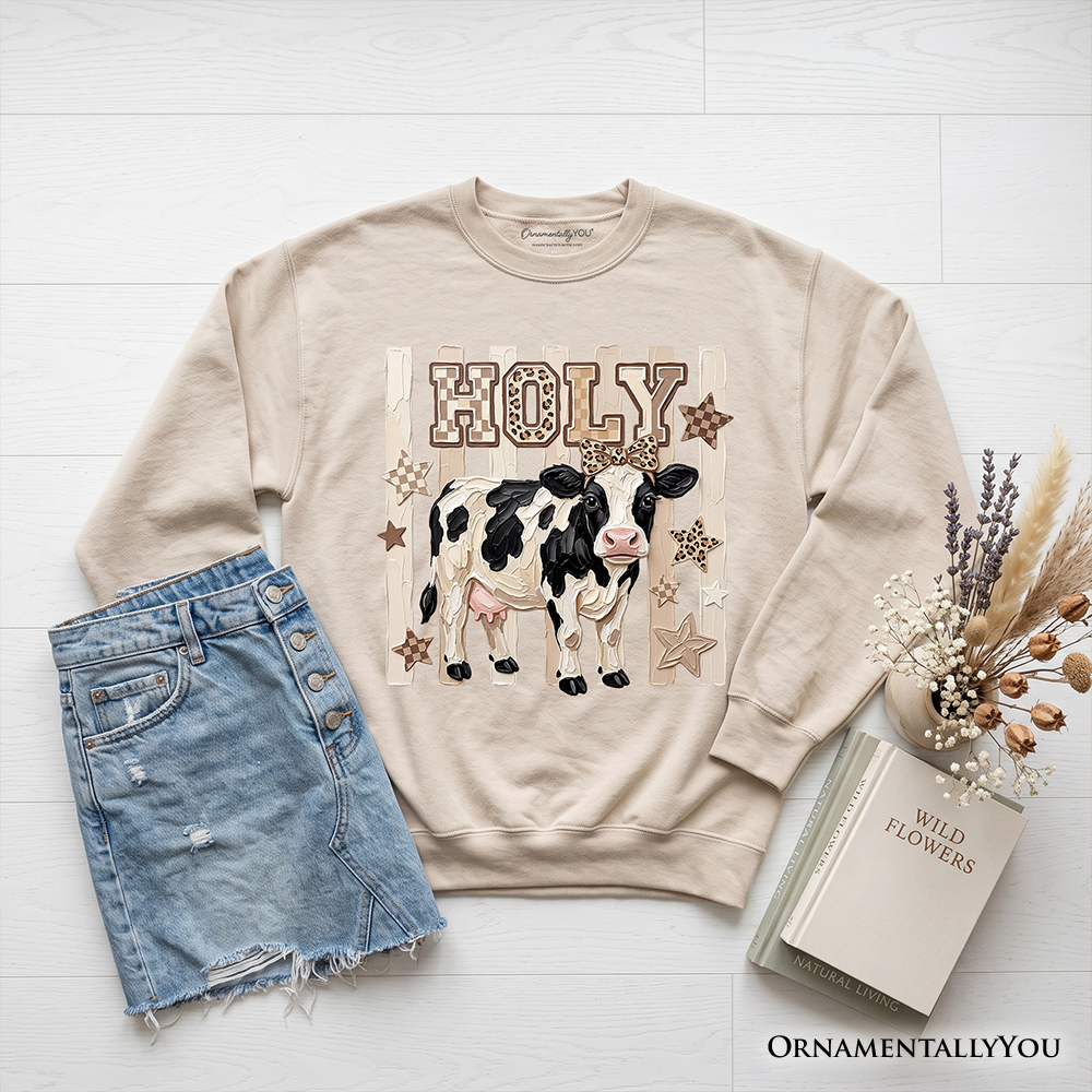 Holy Cow Coquette sweatshirt by OrnamentallyYou featuring a leopard print bow on a farm animal-themed sweatshirt.