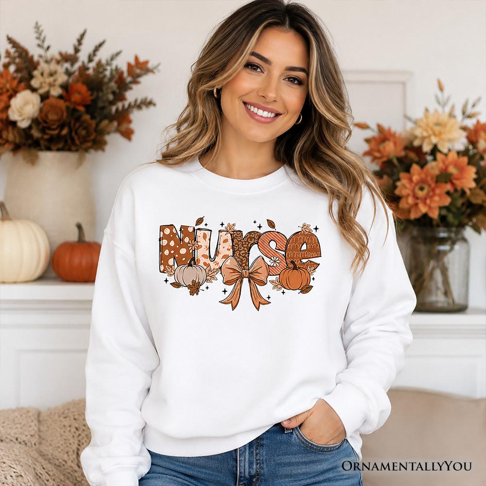Nurse Coquette autumn sweatshirt by OrnamentallyYou with cozy fall pumpkins design, perfect for healthcare heroes.