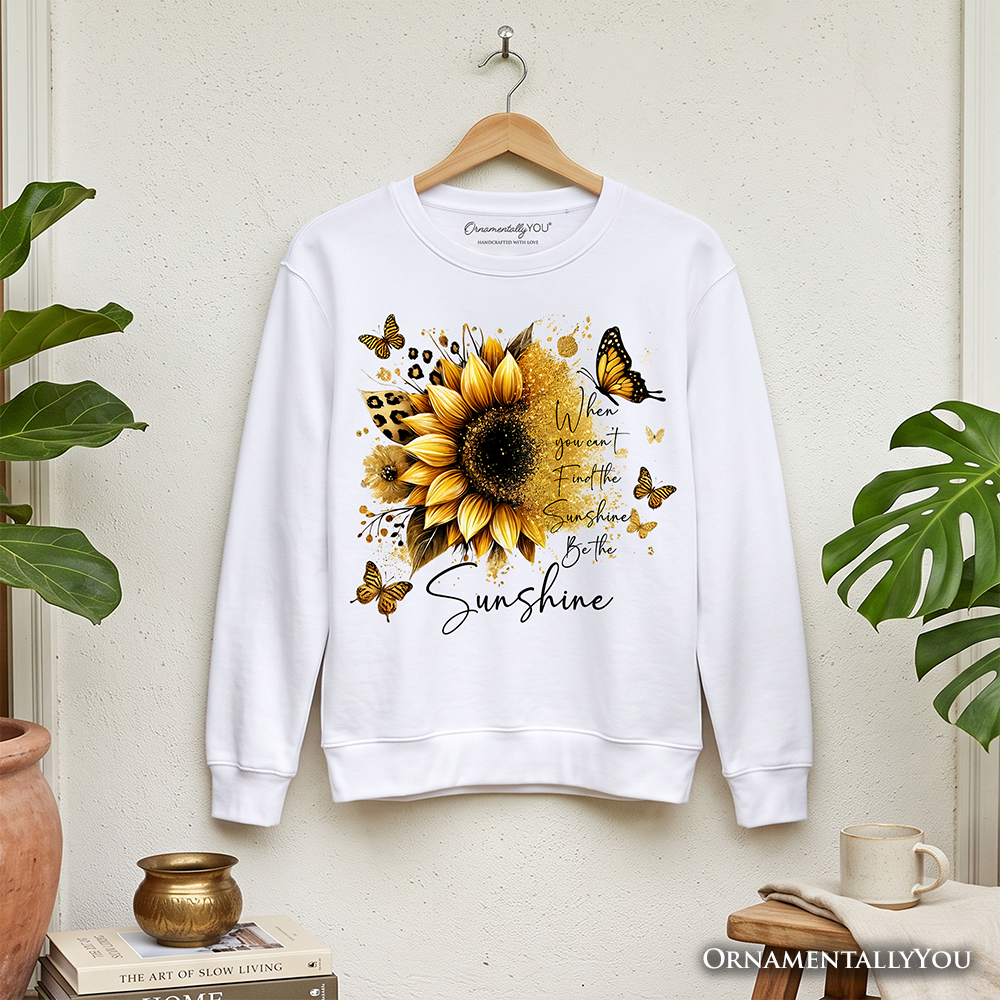 Sunflower inspirational quote sweatshirt by OrnamentallyYou featuring the message "When you can't find the sunshine, be the sunshine."