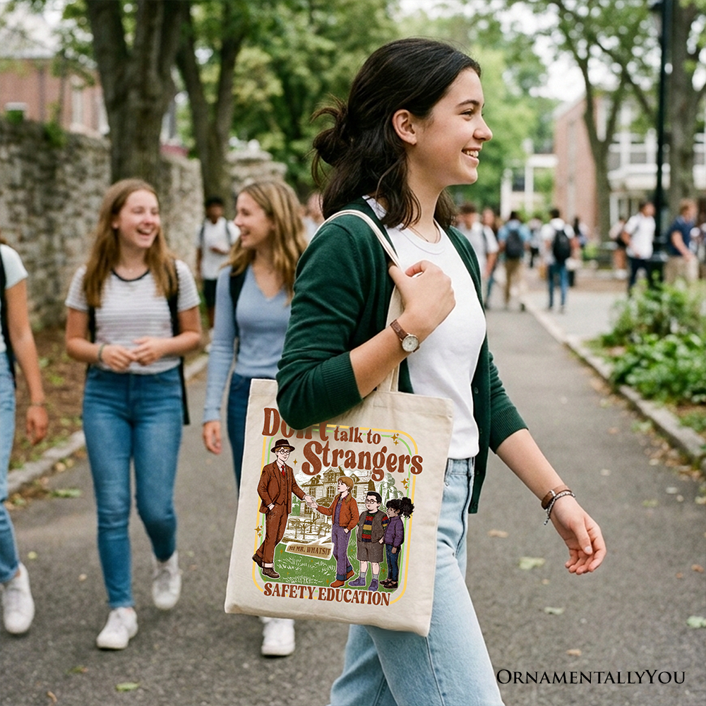 Beige tote bag from OrnamentallyYou featuring a "Don't Talk to Strangers" safety education print, perfect for retro funny gift shopping.