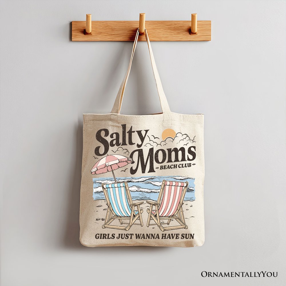 Beige Salty Moms Beach Club canvas tote bag with retro summer design, ideal for ocean-loving mothers and beach outings.