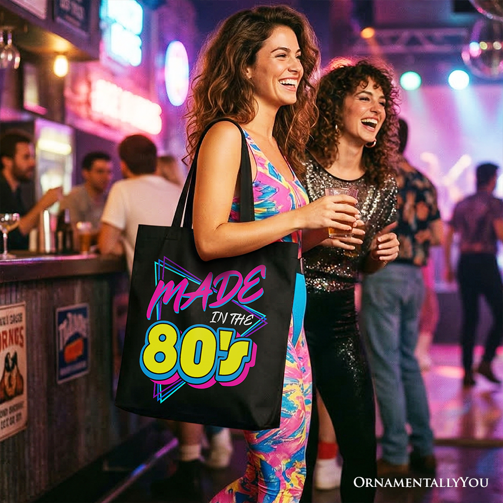 Black Made In The 80s tote bag by OrnamentallyYou with neon retro eighties design, perfect for casual shoppers and retro style fans.