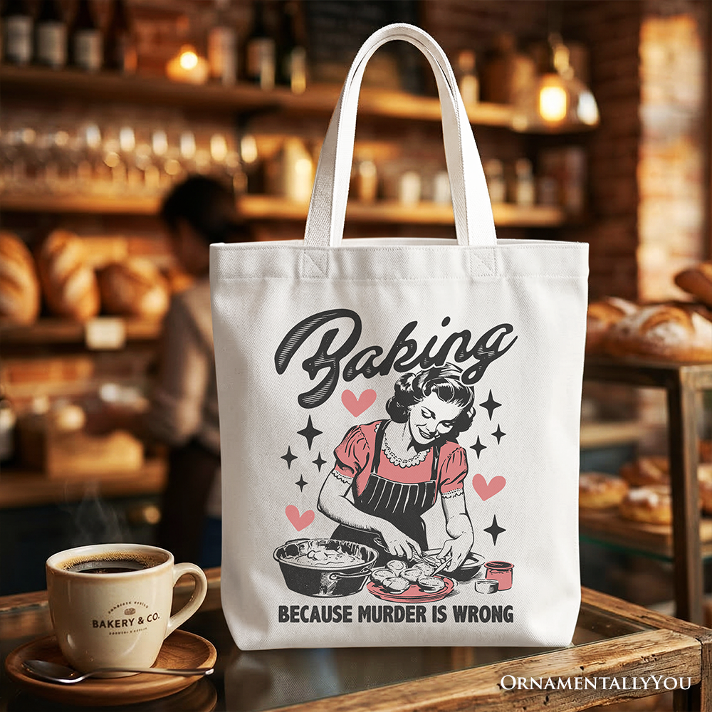 White tote bag featuring humorous "Baking Because Murder Is Wrong" slogan, retro kitchen design, and OrnamentallyYou branding.