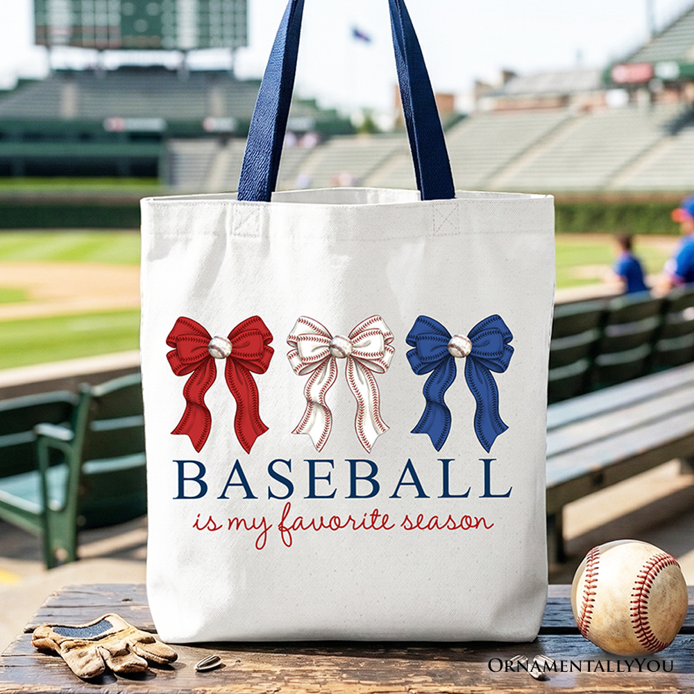 White tote bag with baseball and coquette bow design, perfect for game day, by OrnamentallyYou, ideal for sports fans and gift shoppers.