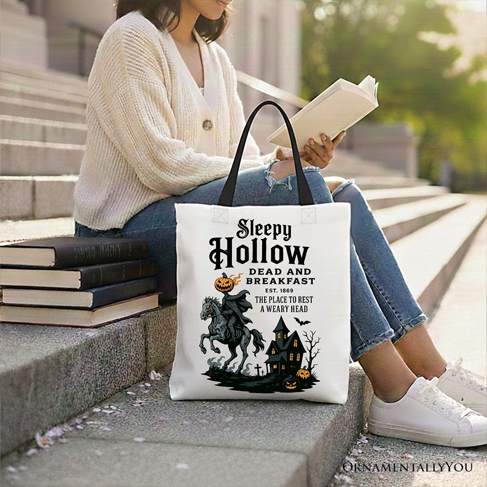 White canvas tote bag featuring a Headless Horseman Sleepy Hollow Halloween design with retro Dead and Breakfast theme.