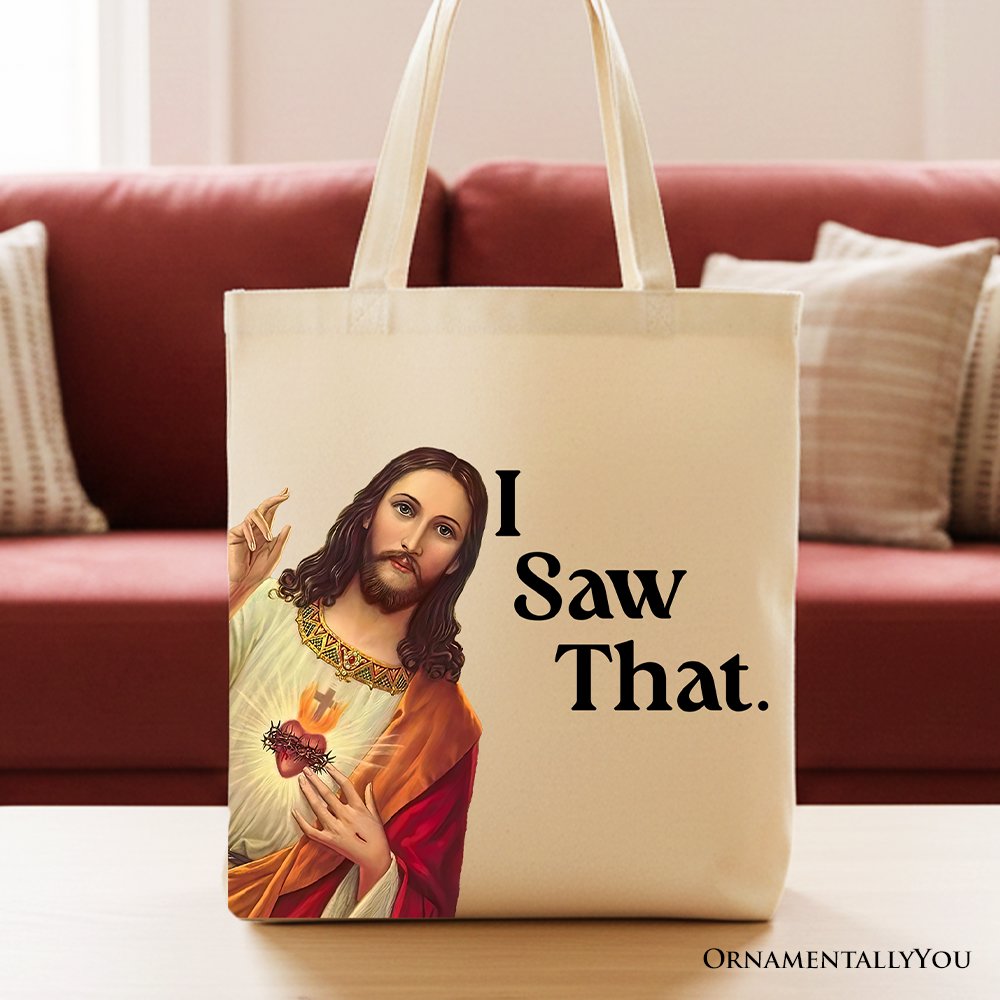 White canvas tote bag featuring a whimsical Jesus "I Saw That" design, perfect for Christian gift shoppers.