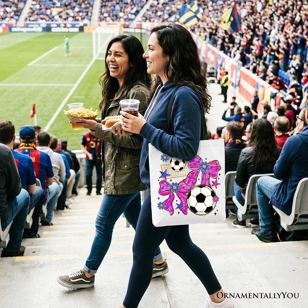 OrnamentallyYou pink bow tote bag with soccer design, perfect for preppy game day or shopping, featuring a stylish and sporty look.