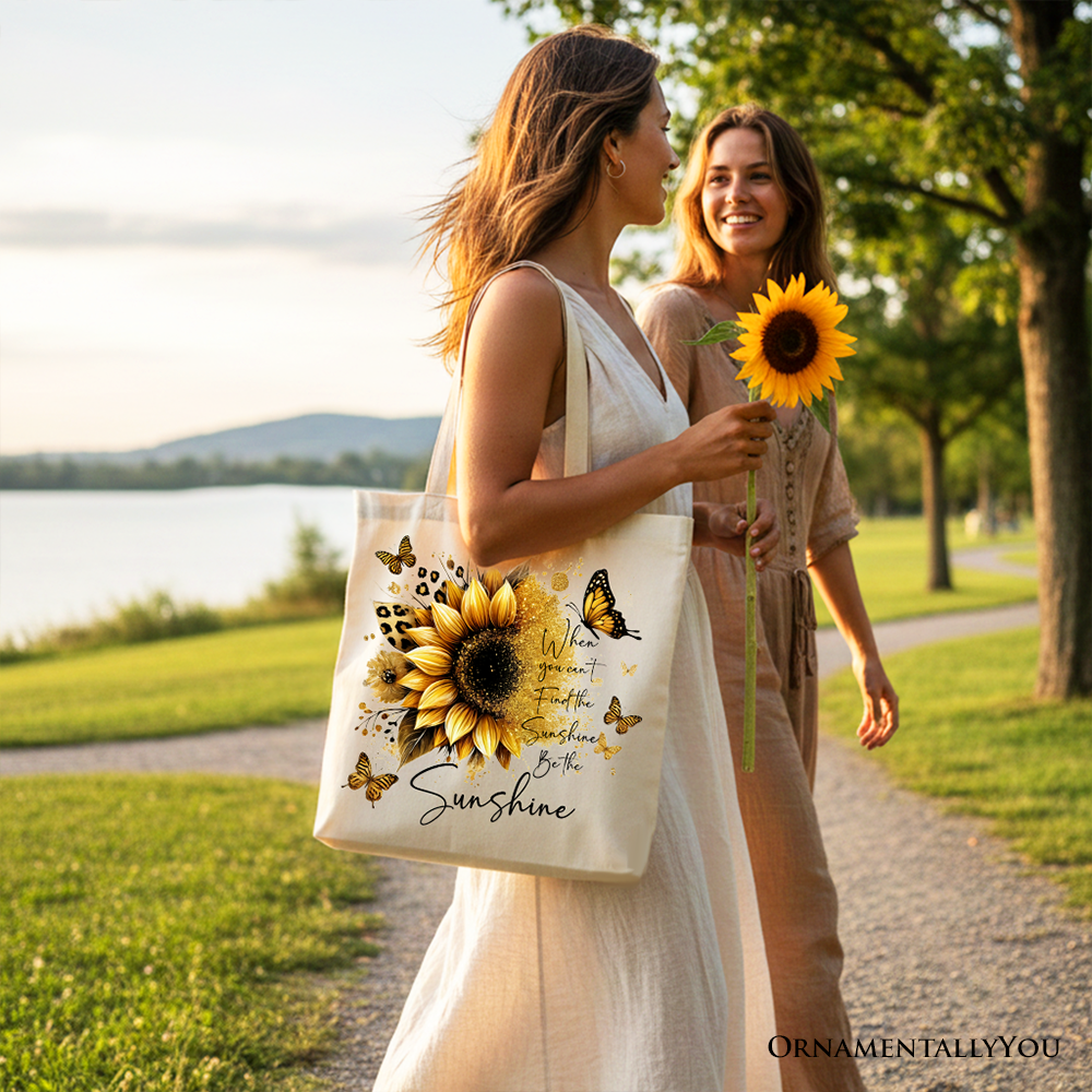 White canvas tote bag with sunflower and inspirational quote, featuring the message "When you can't find the sunshine, be the sunshine."