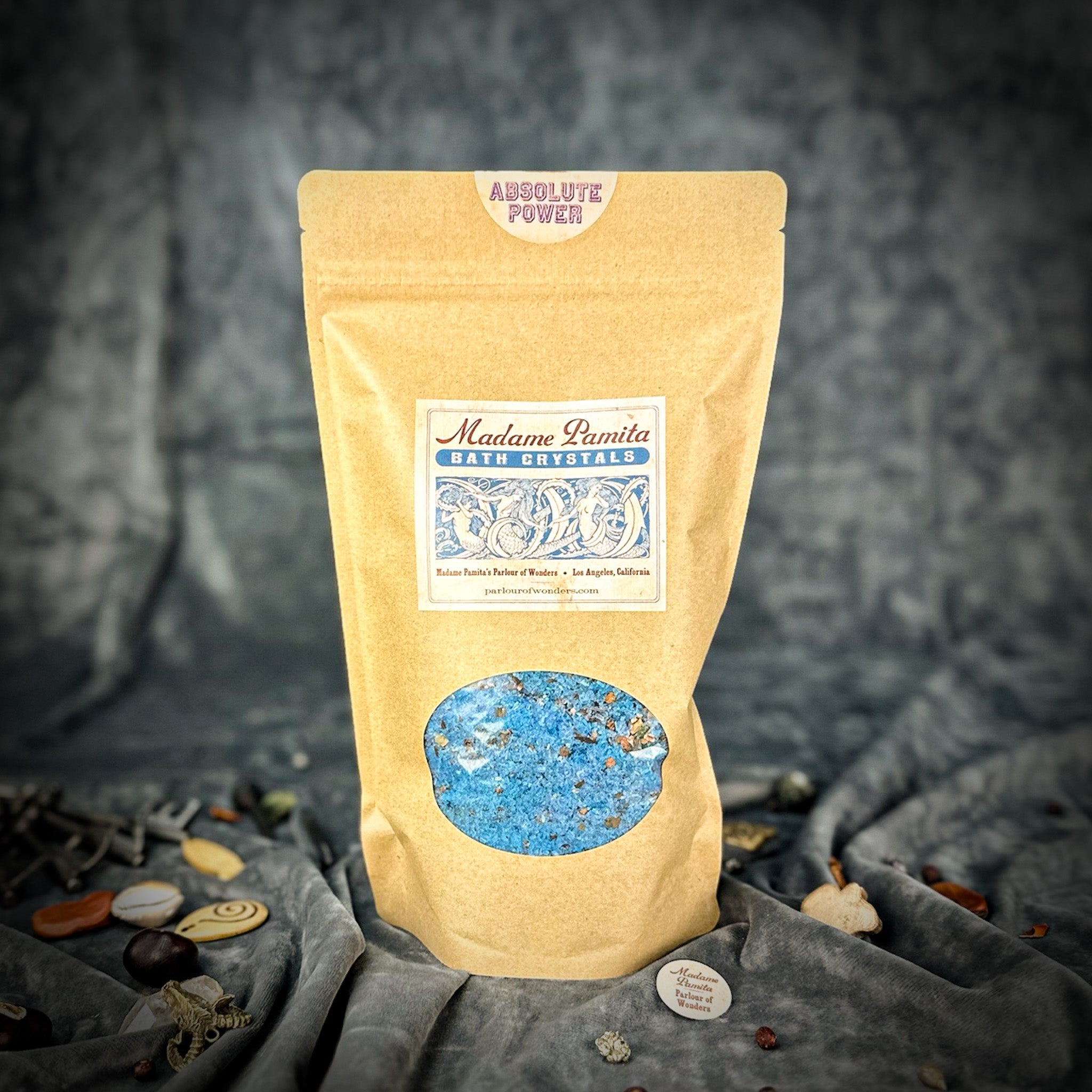 Small jar of Parlour of Wonders Absolute Power Bath Crystals with colorful crystals inside, designed for relaxing bath experiences.